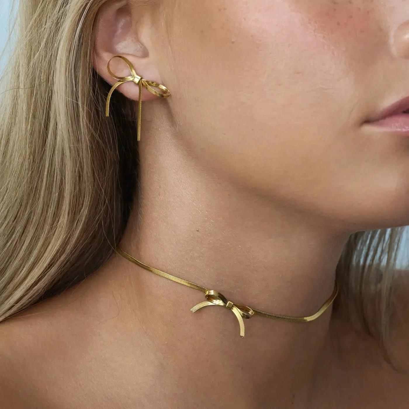TIMI OF SWEDEN Juliette halskæde sløjfe guld 33+5 cm