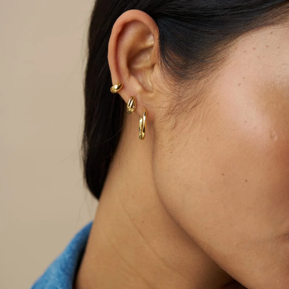 Orelia Mini Twist micro huggie øreringe guld snoet