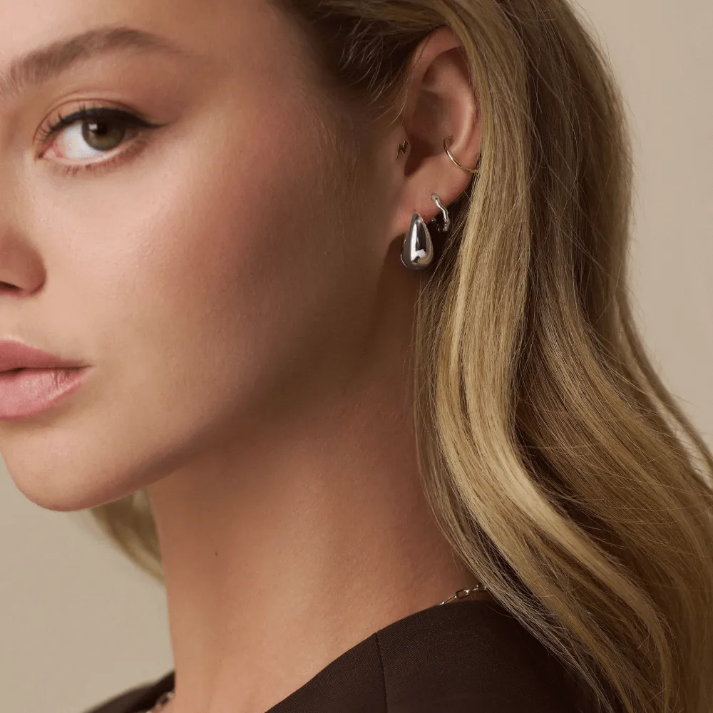Orelia Organic Round Wave huggie hoops sølv