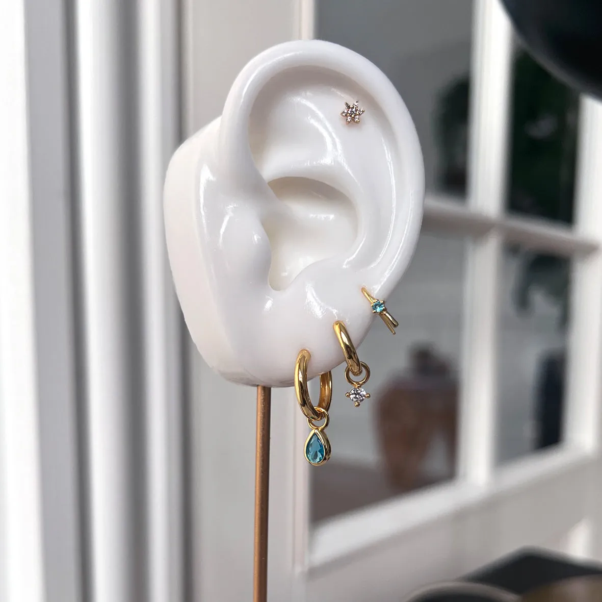 Bykjaergaard Individual charm guld blå topas