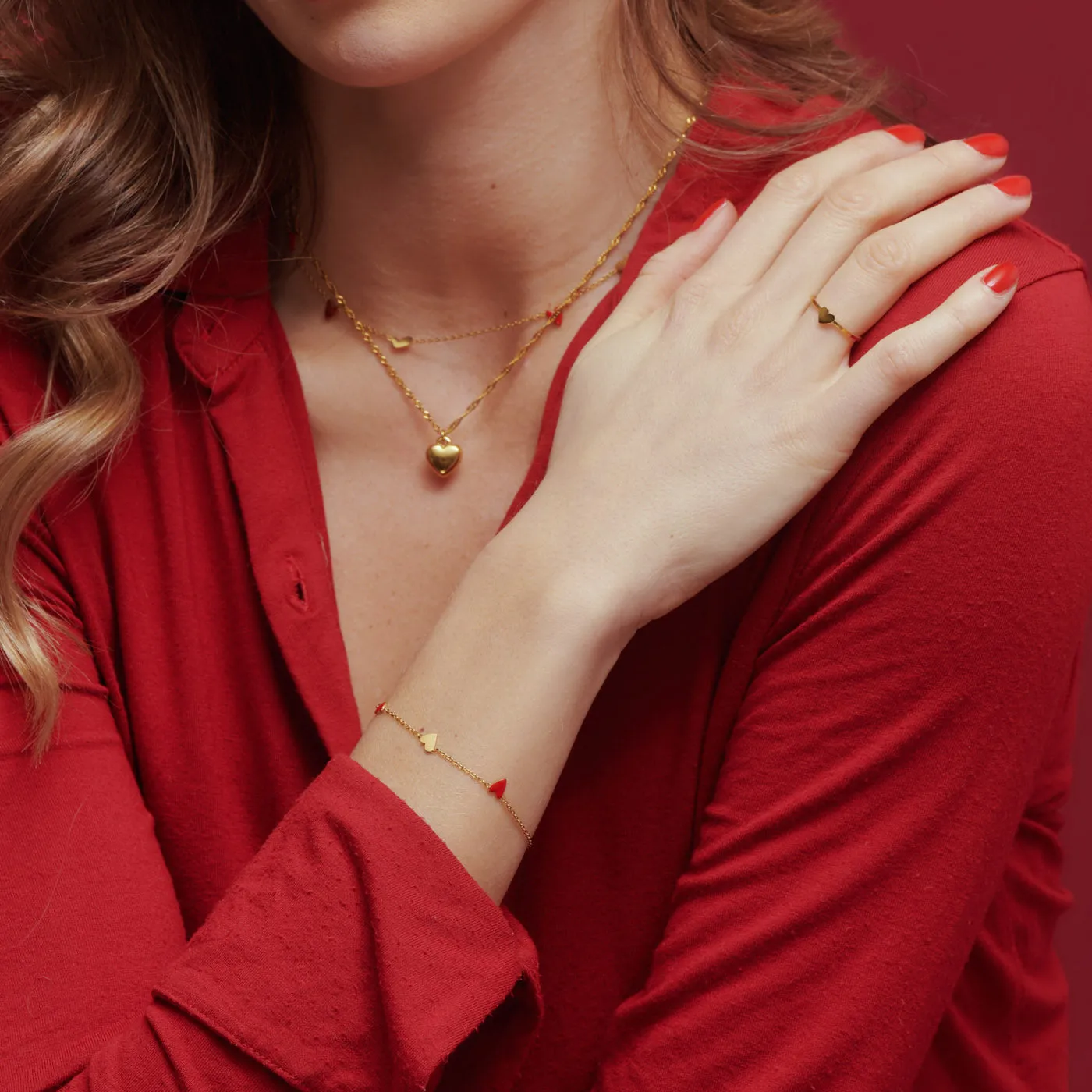 TIMI OF SWEDEN Linnea hjerte armbånd rød guld waterproof