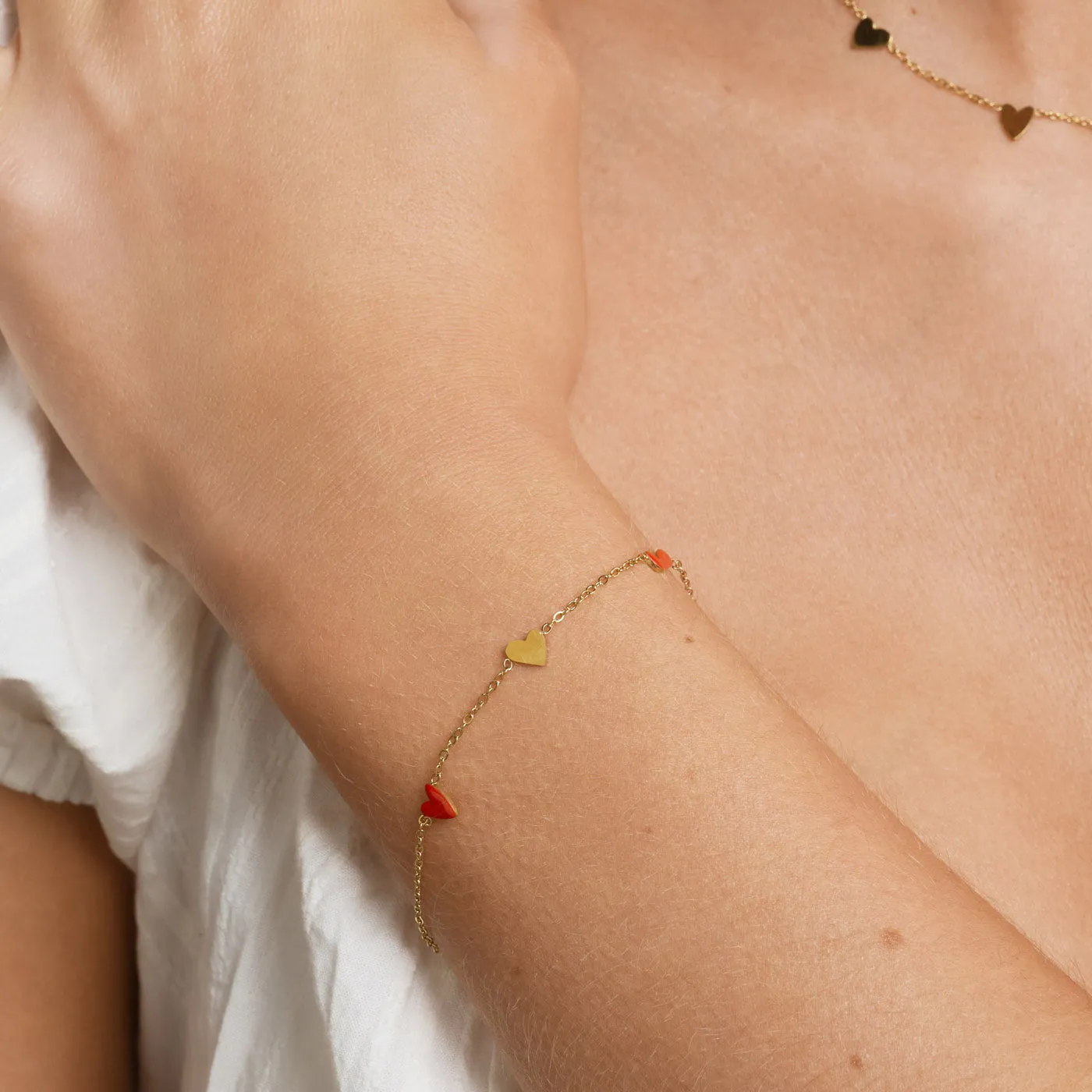 TIMI OF SWEDEN Linnea hjerte armbånd rød guld waterproof