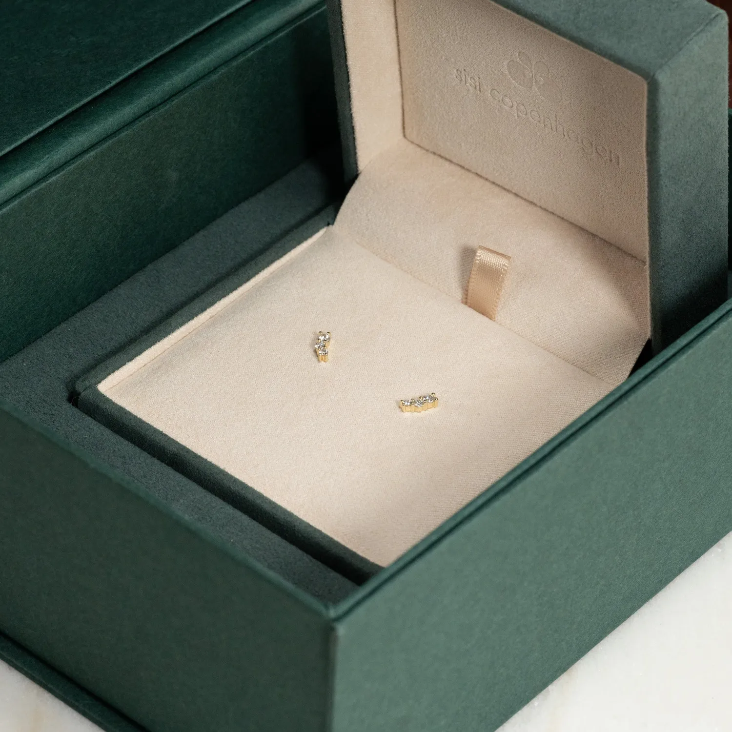 Sisi Copenhagen Graduating Curved diamantørestikker 0,22 ct guld