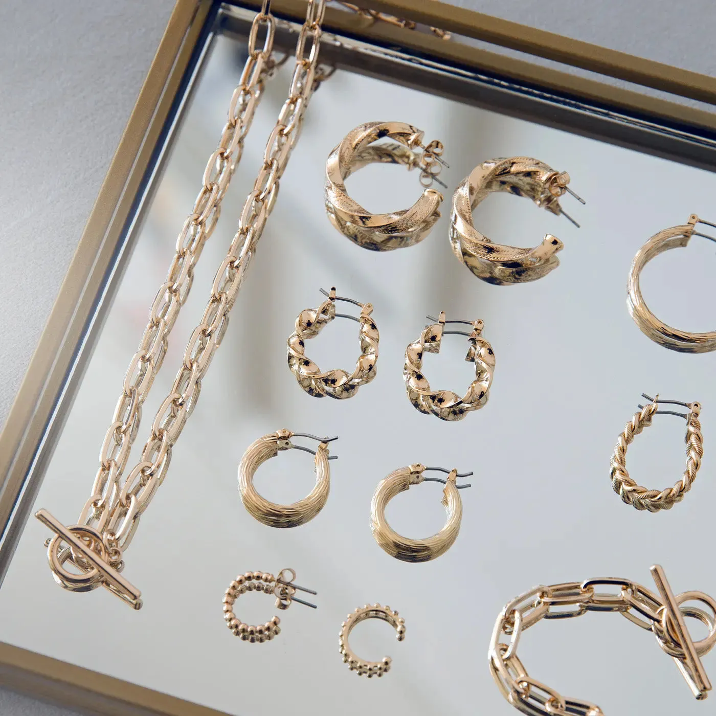 TIMI OF SWEDEN Twisted Hoop øreringe guld chunky