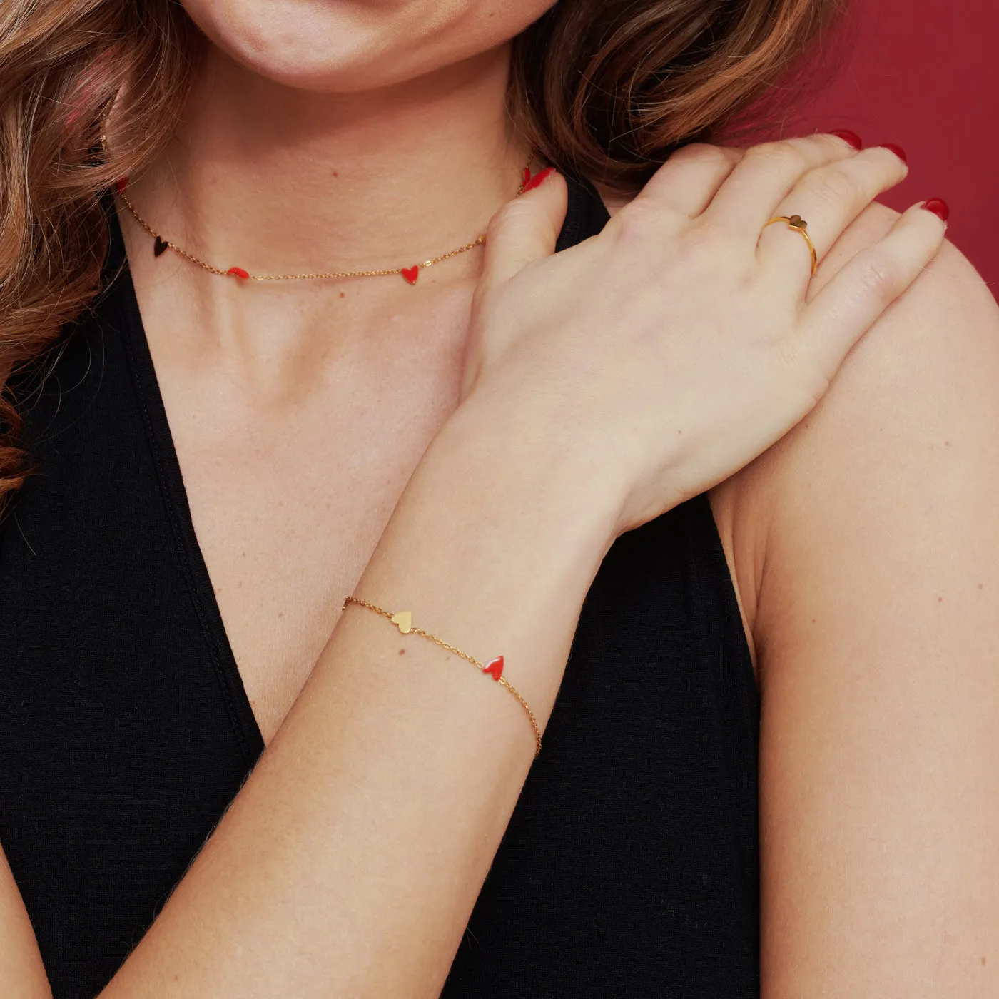 TIMI OF SWEDEN Linnea hjerte armbånd rød guld waterproof