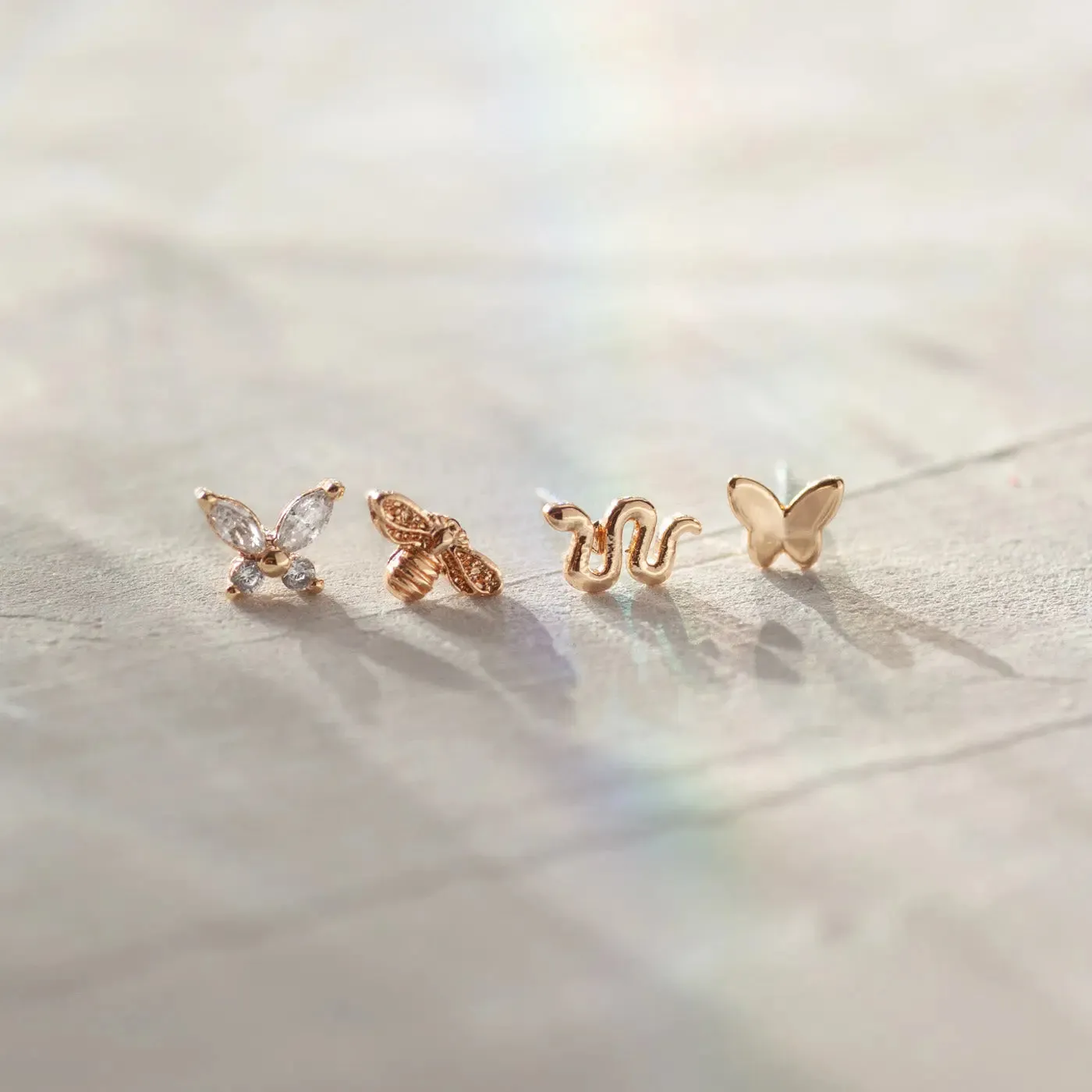 TIMI OF SWEDEN Liza Mini Snake Stud øreringe guld børstet