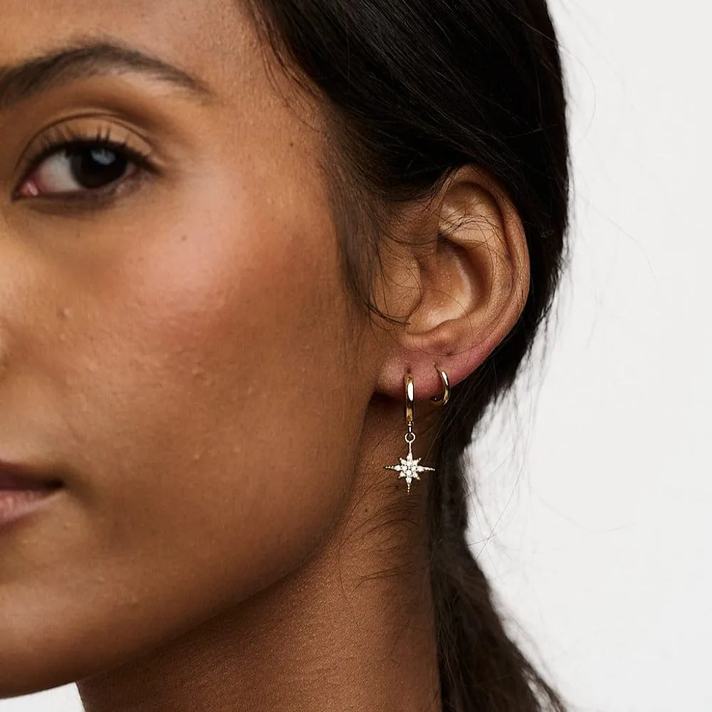 Orelia Starburst Huggie Hoop øreringe guld pavé stjerne