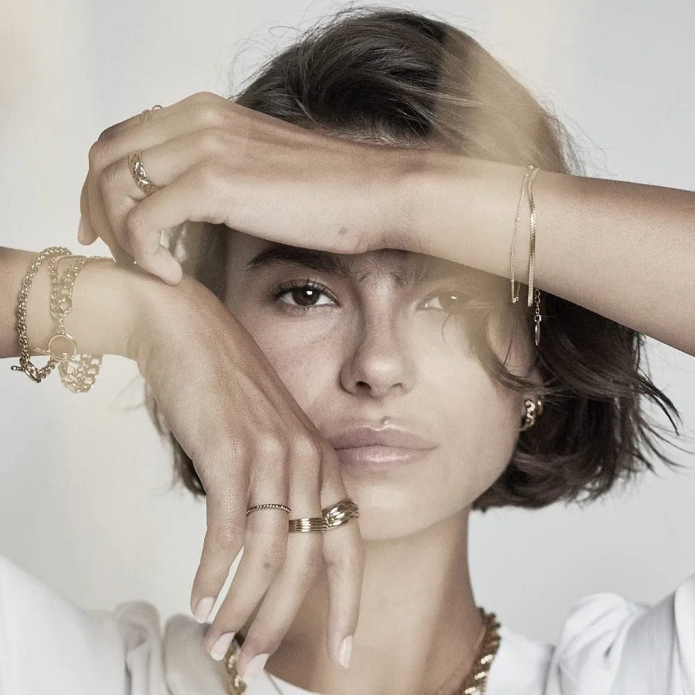 Orelia Satellite Flat Curb armbånd guld duo
