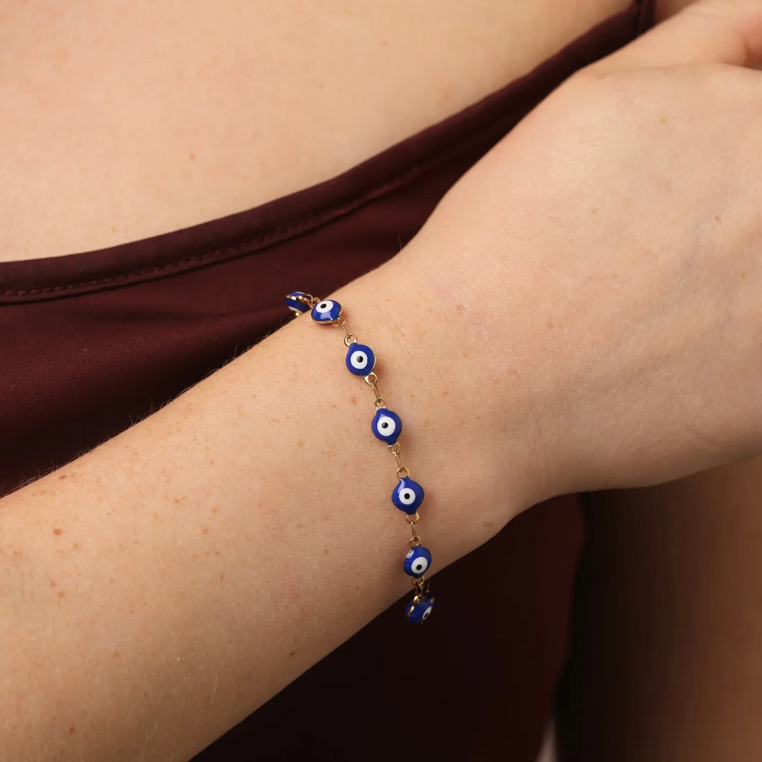 TIMI OF SWEDEN Uma armbånd ondt øje guld stål