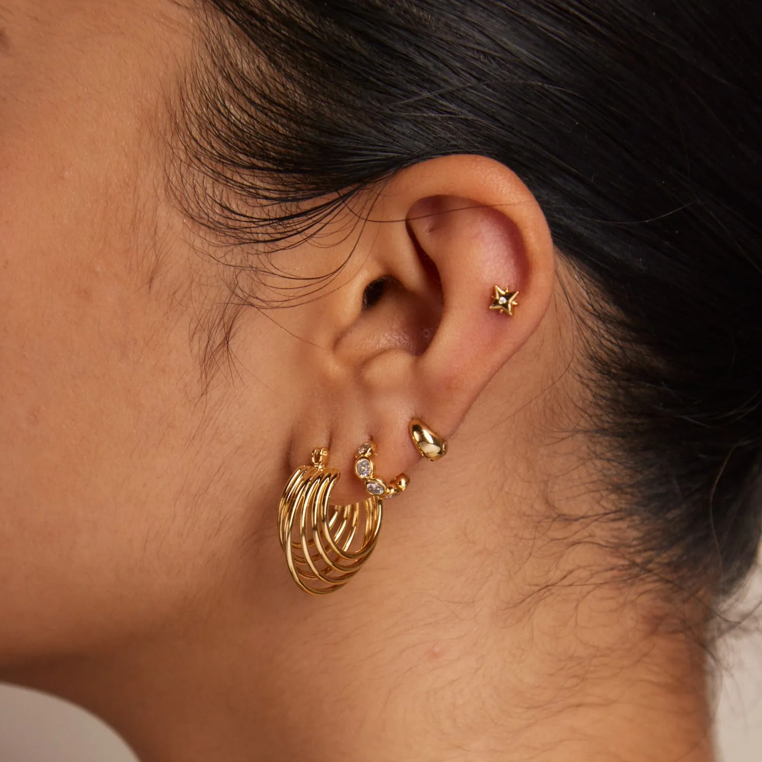 Orelia Metal Starburst Barbell stud ørering forgyldt
