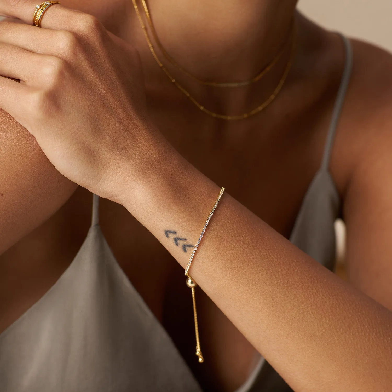 Orelia Fine Crystal Tennis Slider armbånd guld justerbar