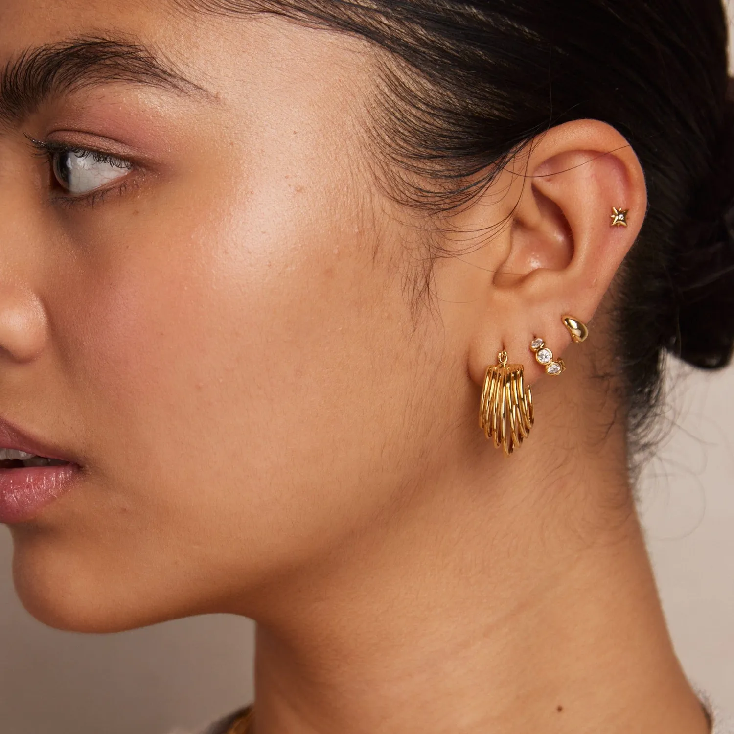 Orelia Metal Starburst Barbell stud ørering forgyldt