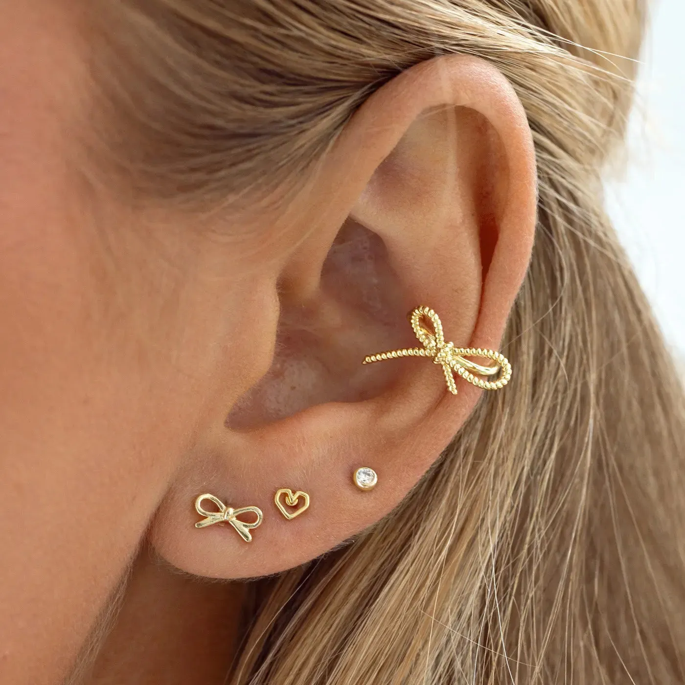 TIMI OF SWEDEN Juliette ear cuff sløjfe forgyldt