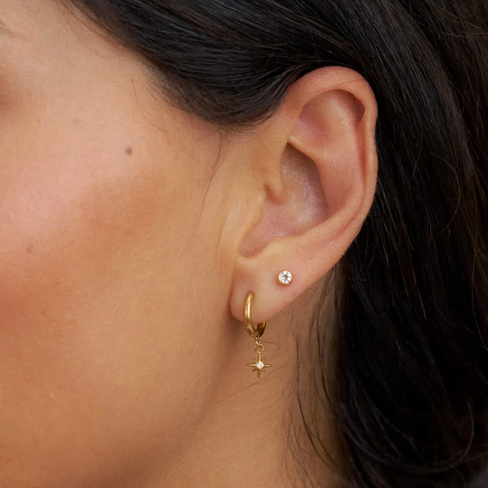 Orelia LUXE Petite Starburst huggie hoops krystal