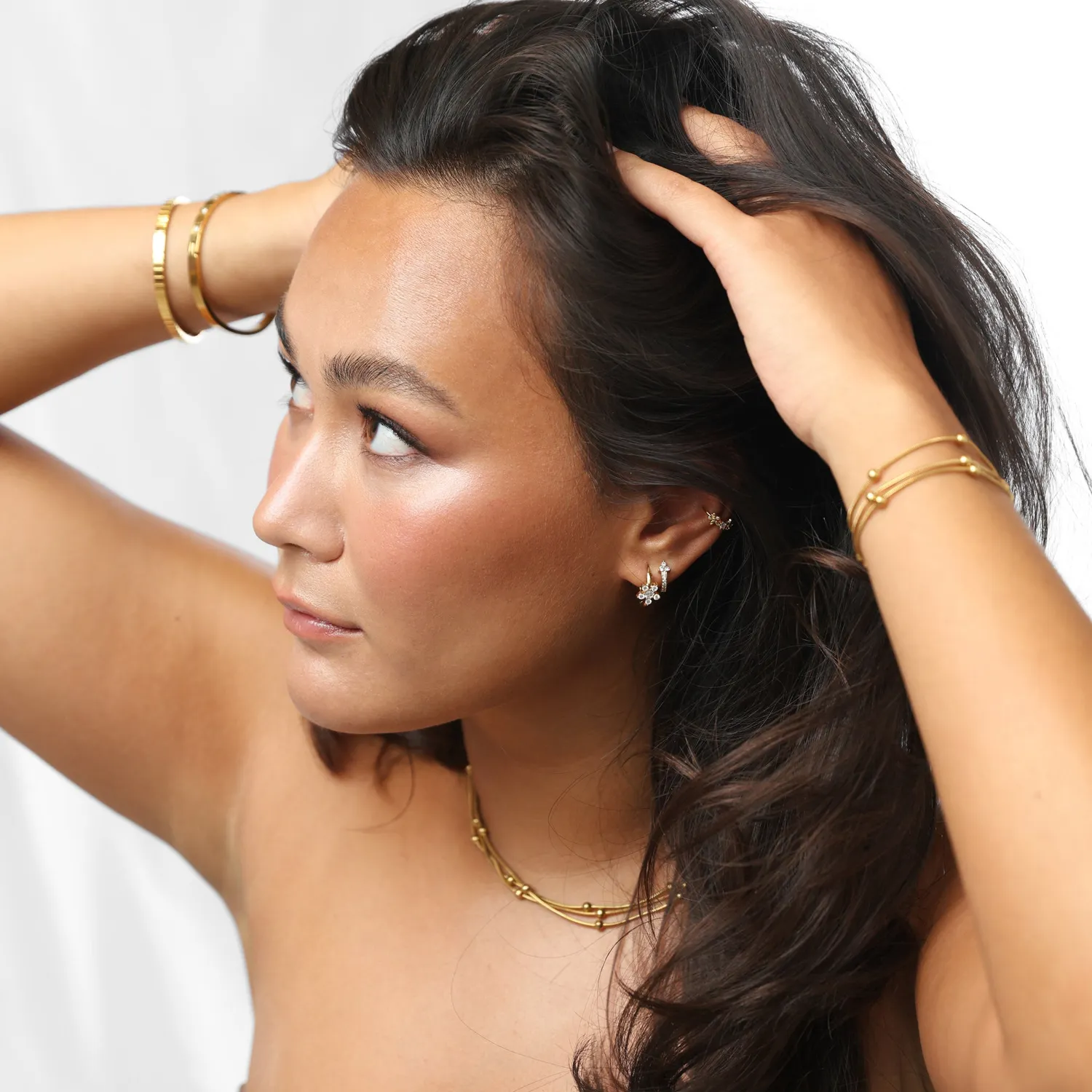 TIMI OF SWEDEN Georgie ear cuff blomst guld 1 stk