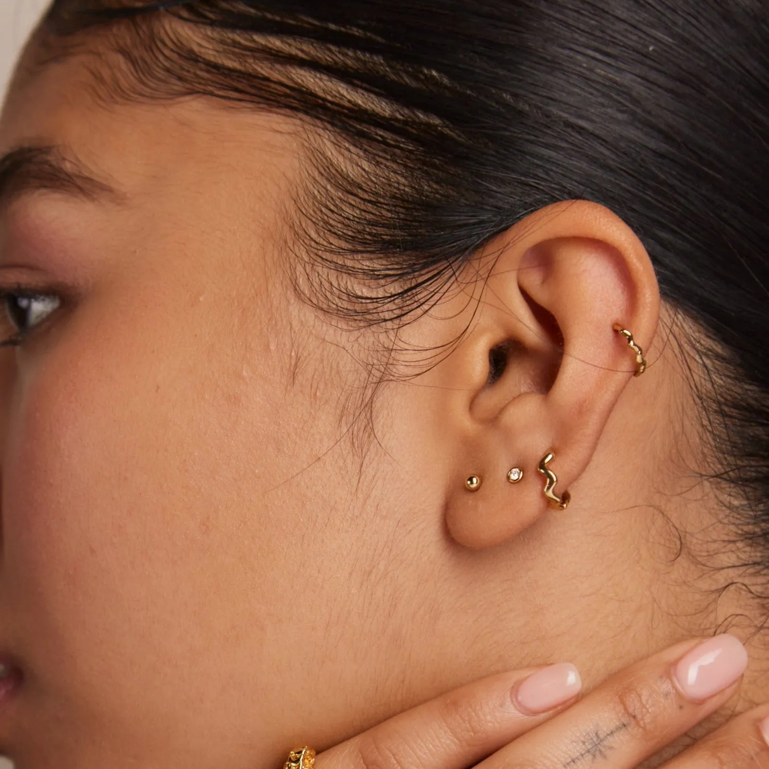 Orelia Fine Wave Clicker Hoop piercing guld helix