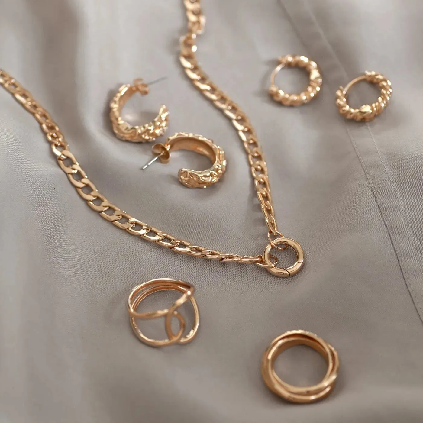 TIMI OF SWEDEN tykke ujævne hoop øreringe guld 20 mm
