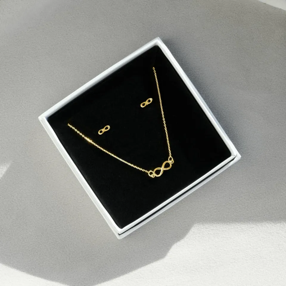 TIMI OF SWEDEN Infinity smykkesæt guld halskæde øreringe